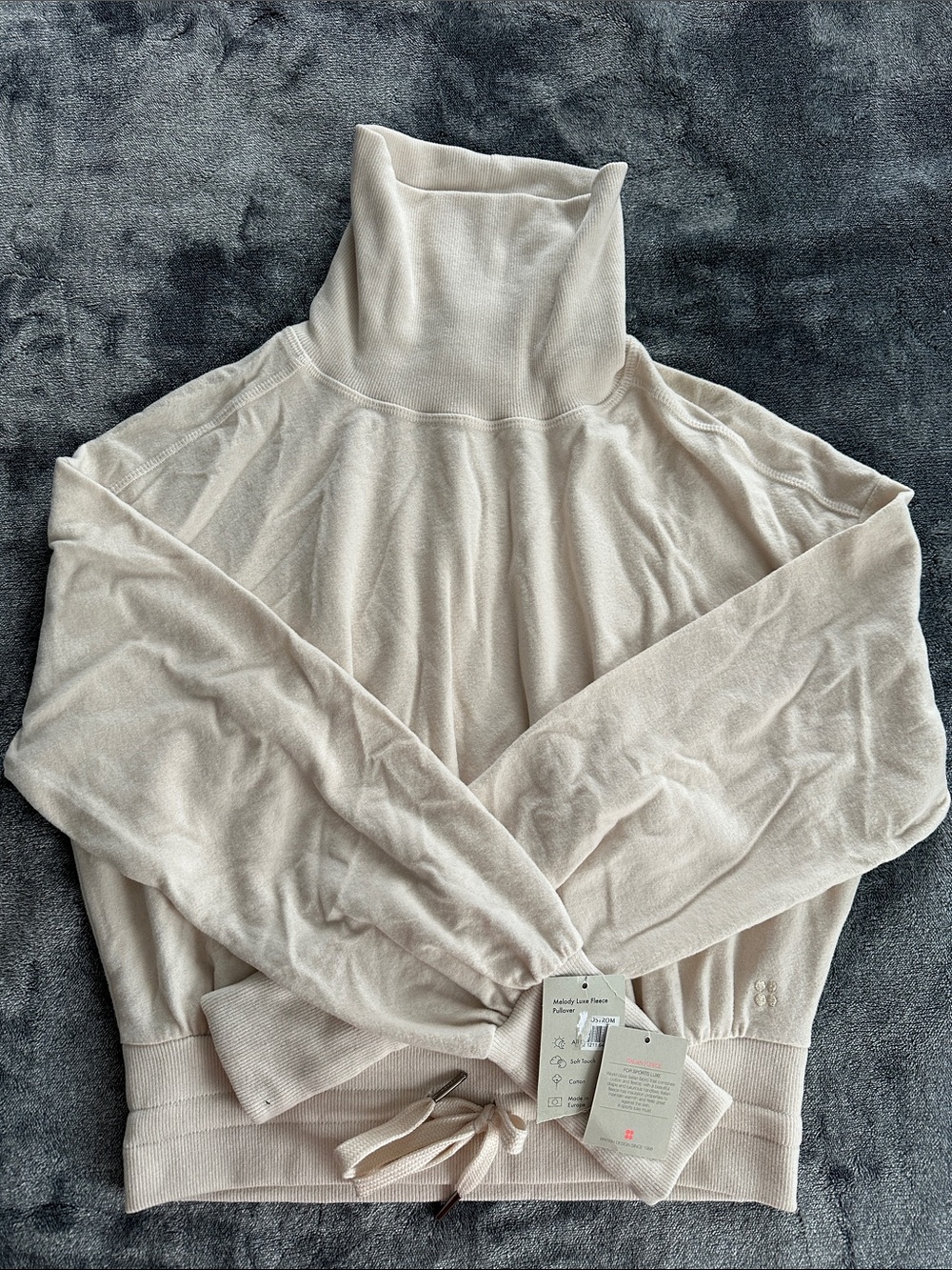 Sweaty Betty Cream Turtleneck Sweater with Drawstring Hem